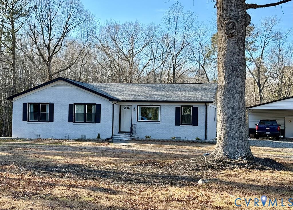 a house with trees in the background