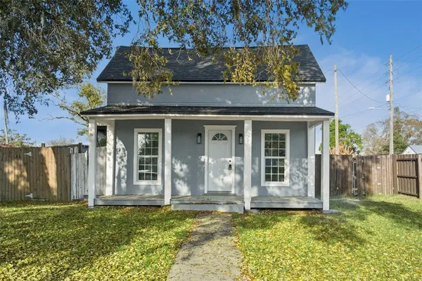 front view of a house with a yard