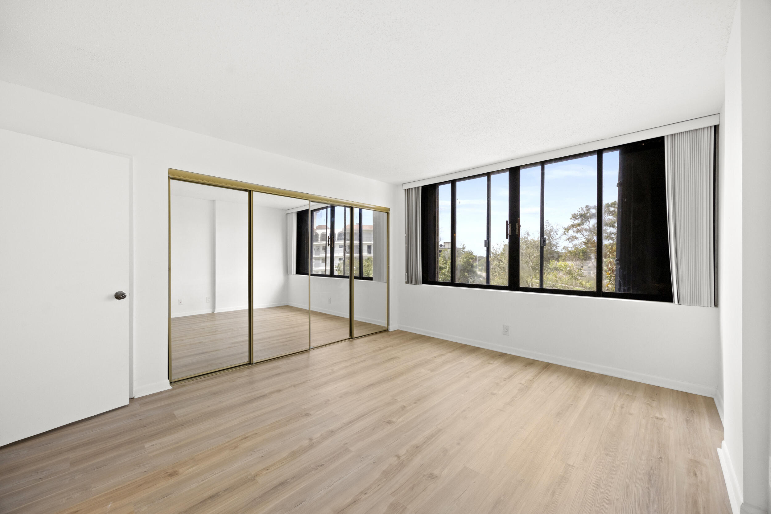 1401 South Federal Highway, Unit 220 Boca Raton, FL 33432 - Photo 22 of 27 a view of an empty room with glass door