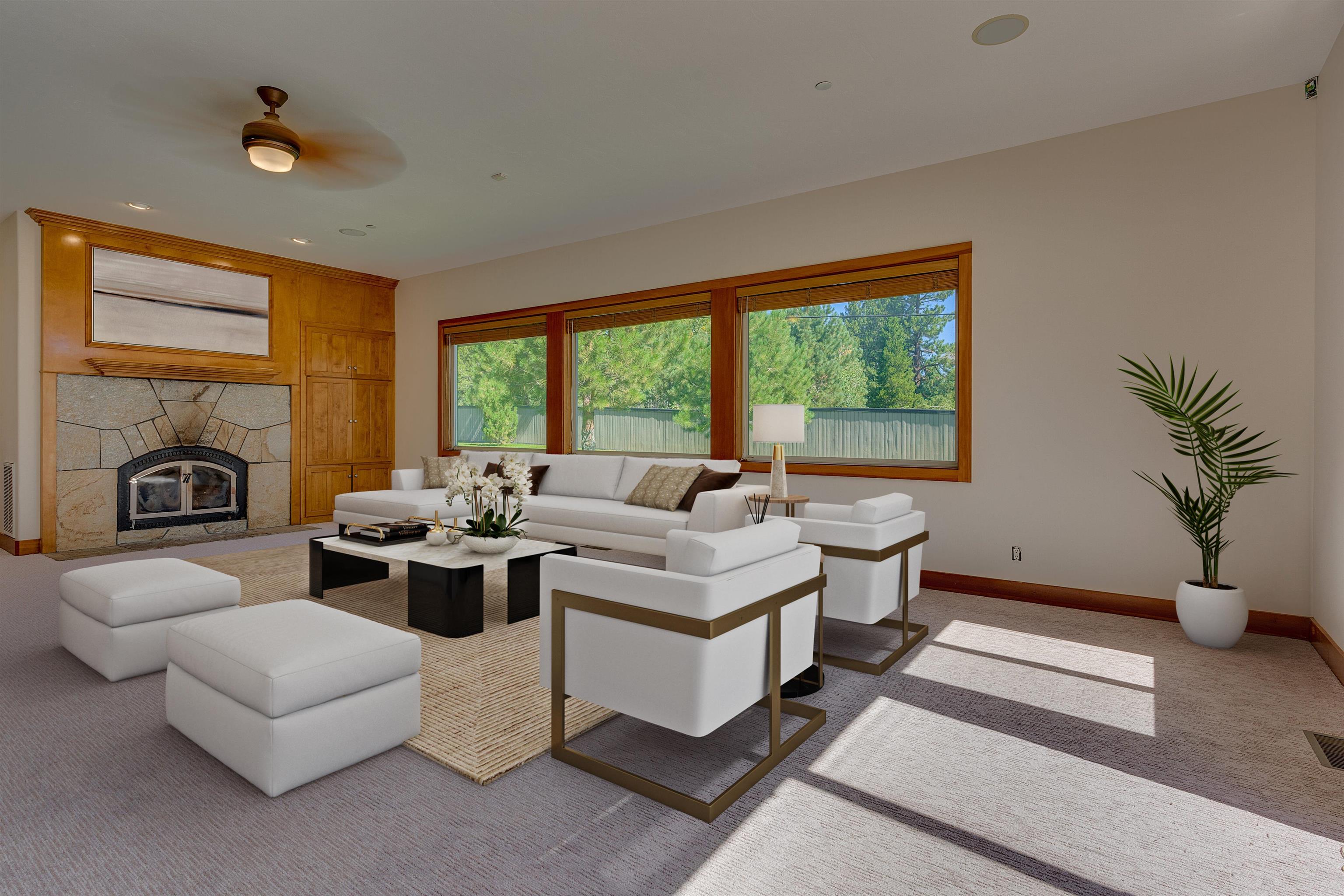 11939 Dove Terrace Truckee, CA 96161 - Photo 11 of 28 a living room with fireplace furniture and a large window