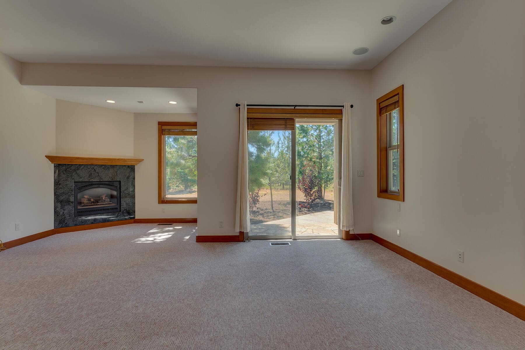 11939 Dove Terrace Truckee, CA 96161 - Photo 14 of 28 a view of empty room with a fireplace