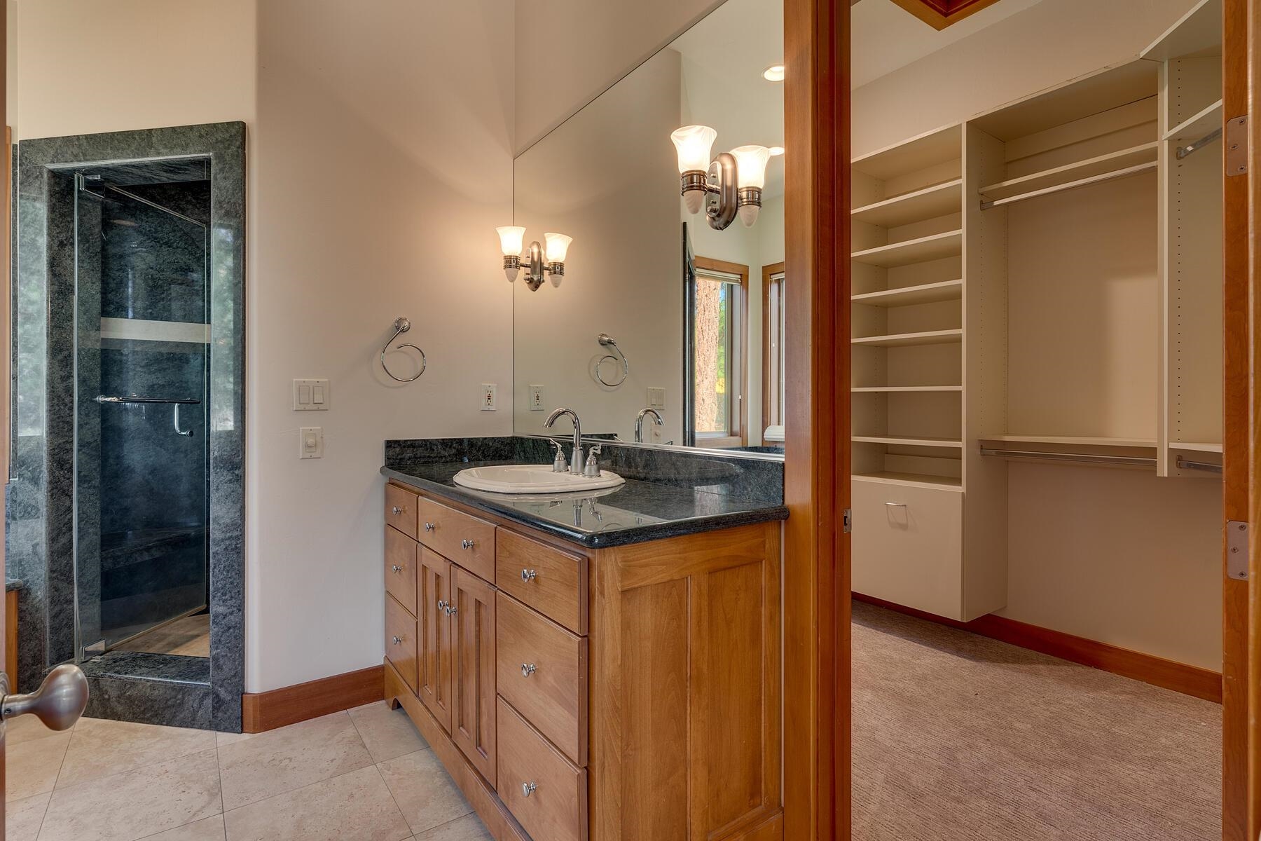 11939 Dove Terrace Truckee, CA 96161 - Photo 15 of 28 a kitchen with a sink and refrigerator