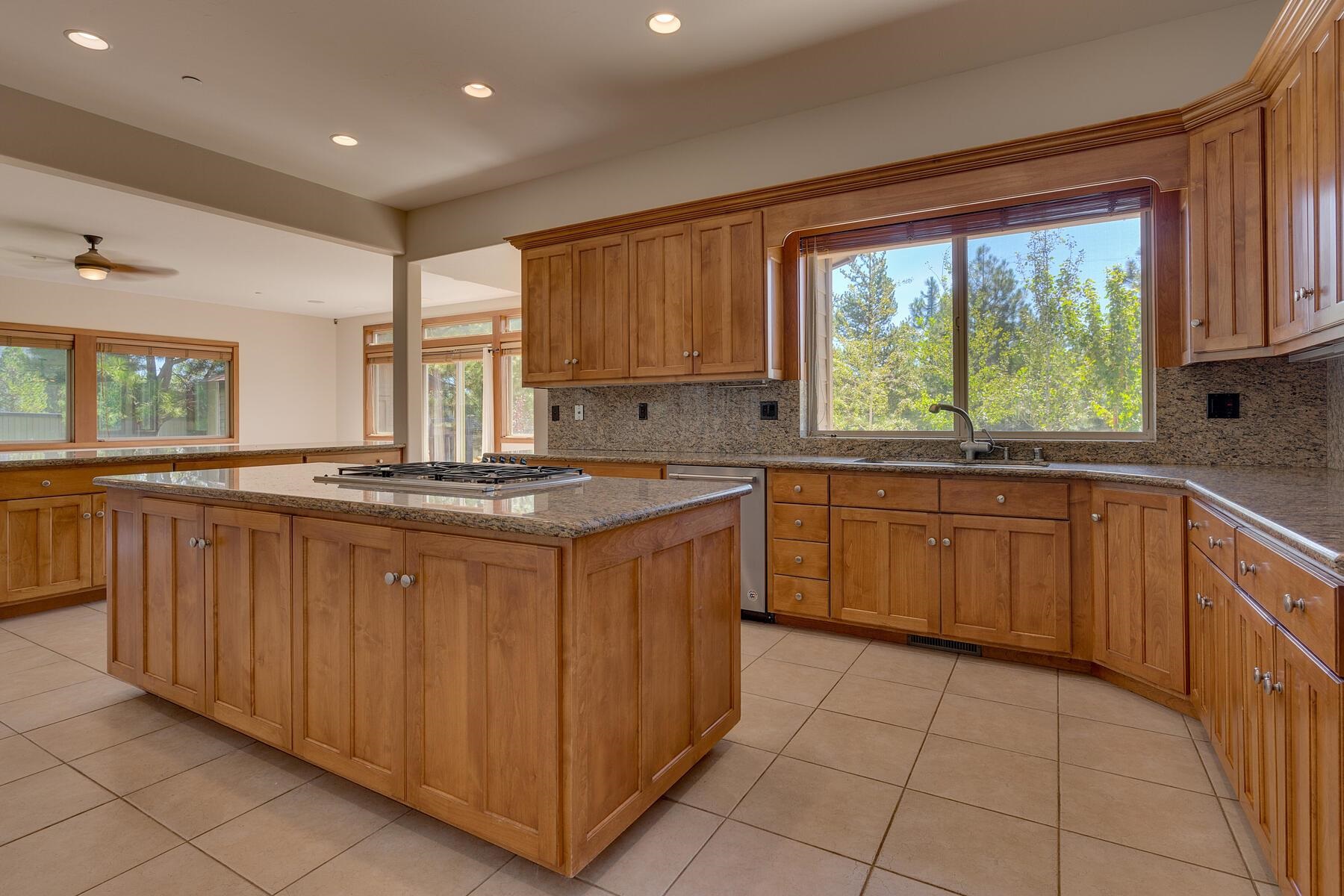 11939 Dove Terrace Truckee, CA 96161 - Photo 17 of 28 a kitchen with a sink window and cabinets