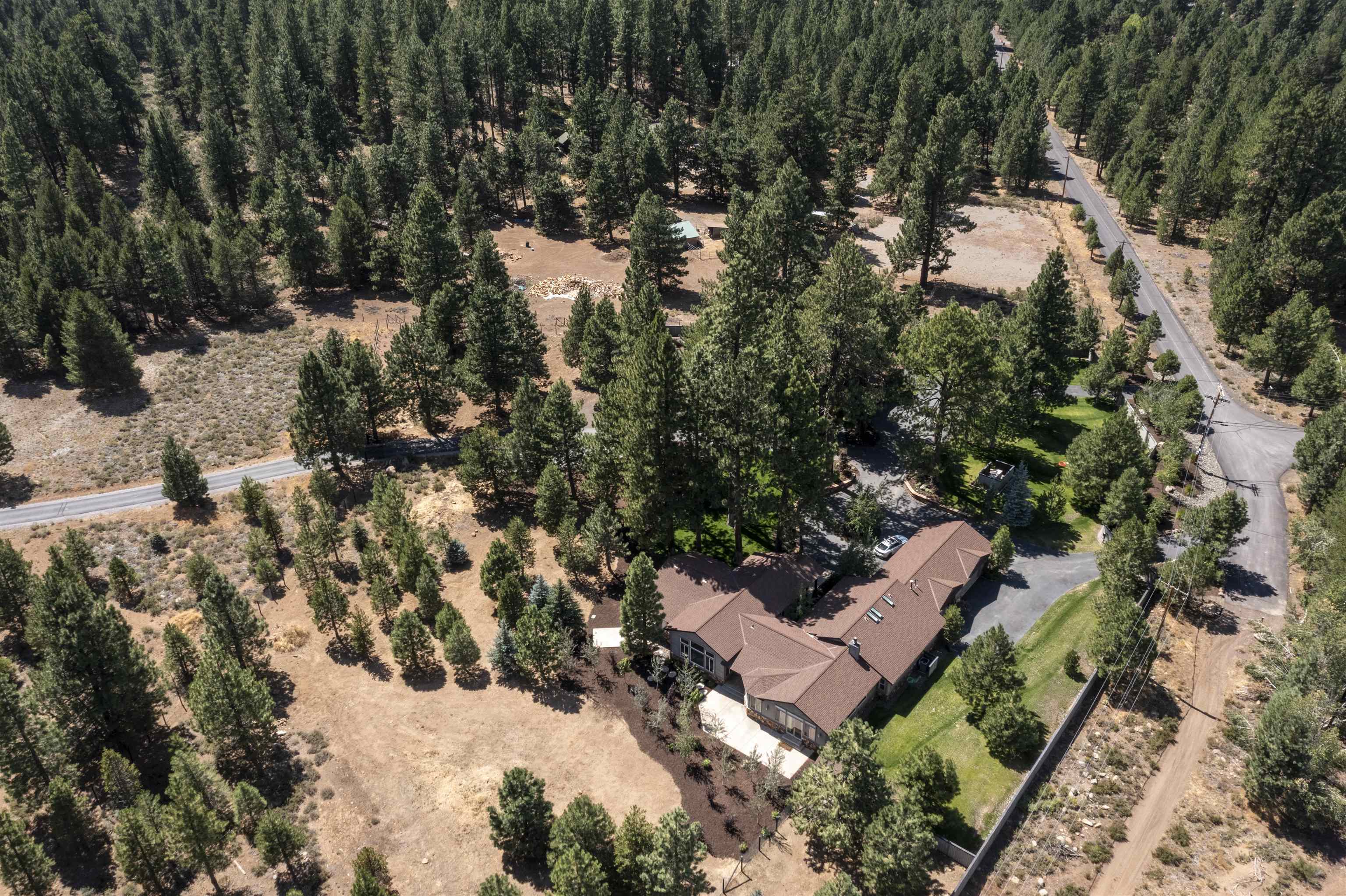 11939 Dove Terrace Truckee, CA 96161 - Photo 26 of 28 a view of a house with a yard