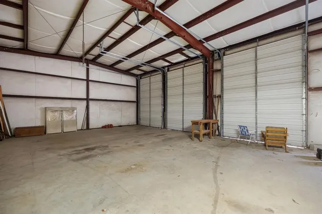 a view of garage with furniture