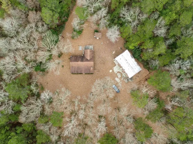 a view of a yard covered with snow