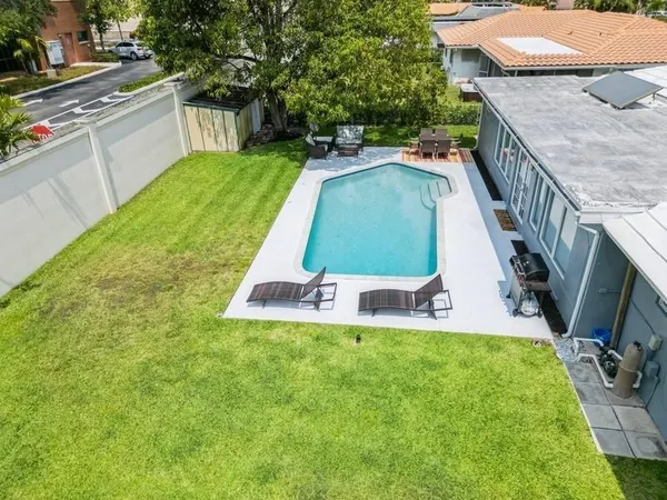 a view of a backyard with a garden