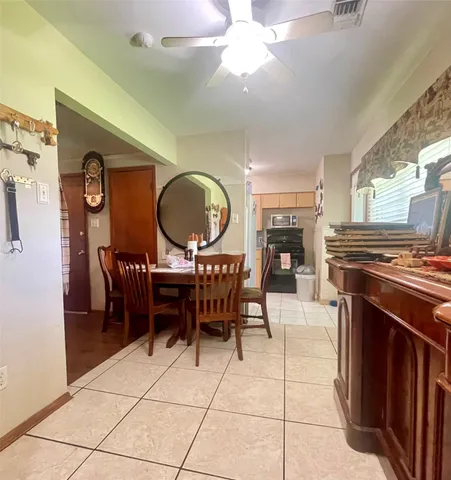 a view of a livingroom with furniture and a fireplace