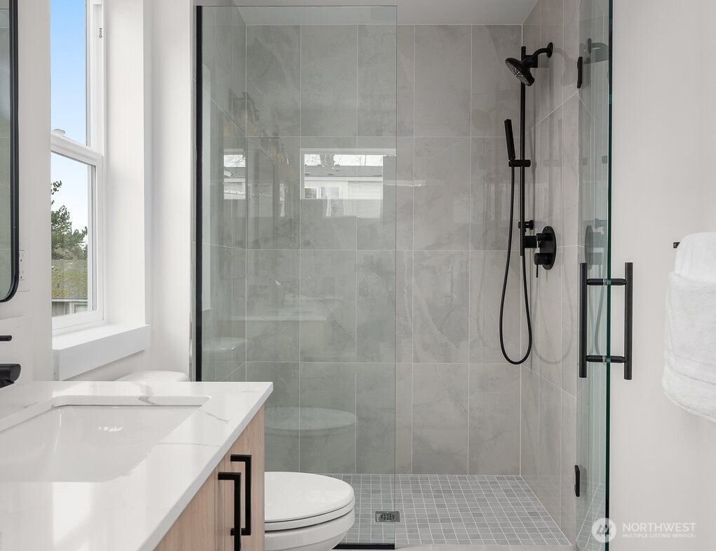 5822 Lowell Larimer Road, Unit B Everett, WA 98208 - Photo 12 of 20 a bathroom with a granite countertop bathtub shower sink vanity and toilet