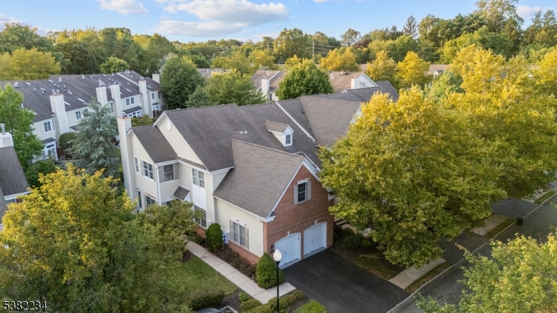 26 Chestnut Court Cedar Grove, NJ 07009 - Photo 2 of 43 an aerial view of multiple houses with yard