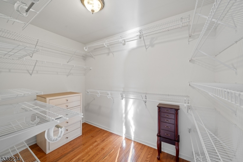 26 Chestnut Court Cedar Grove, NJ 07009 - Photo 23 of 43 a view of a room with racks on the wall