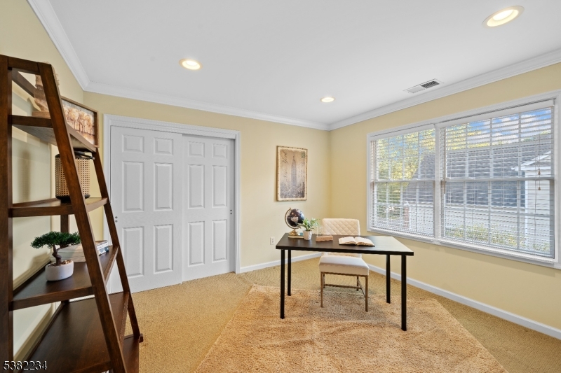 26 Chestnut Court Cedar Grove, NJ 07009 - Photo 28 of 43 a living room with furniture and a window