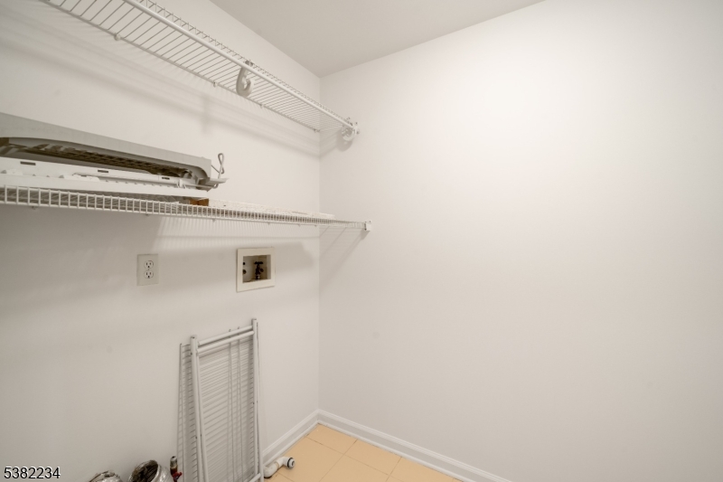26 Chestnut Court Cedar Grove, NJ 07009 - Photo 31 of 43 a view of a kitchen with white cabinets