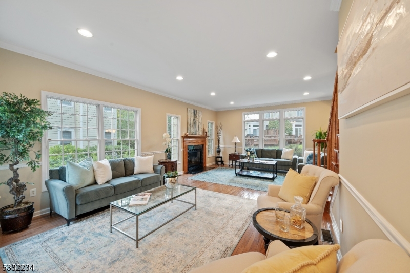 26 Chestnut Court Cedar Grove, NJ 07009 - Photo 4 of 43 a living room with furniture and a large window