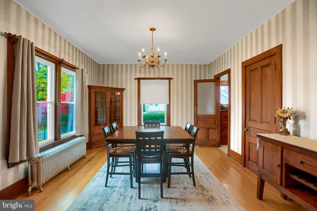 a very nice looking room with a large window and a couch