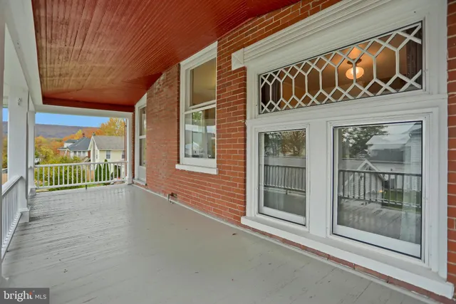 a view of a house with a yard and plants