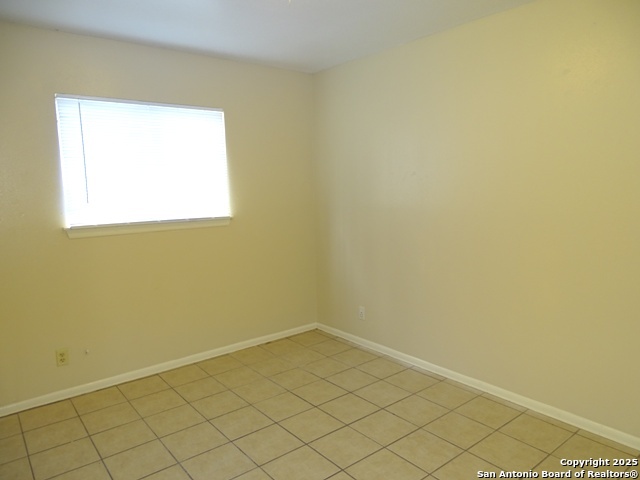 7338 Deep Spring Drive San Antonio, TX 78238 - Photo 21 of 33 a view of a small space with a window
