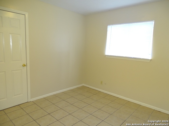 7338 Deep Spring Drive San Antonio, TX 78238 - Photo 23 of 33 a view of a small space with a window