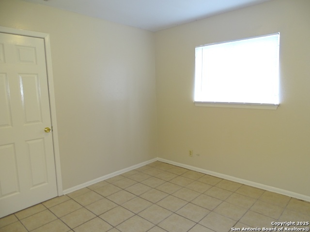 7338 Deep Spring Drive San Antonio, TX 78238 - Photo 29 of 33 an empty room with a window