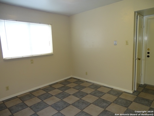 7338 Deep Spring Drive San Antonio, TX 78238 - Photo 5 of 33 an empty room with a window