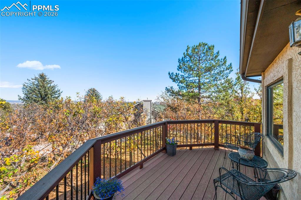 735 Pollux Drive Colorado Springs, CO 80906 - Photo 22 of 50 a view of a balcony with wooden floor