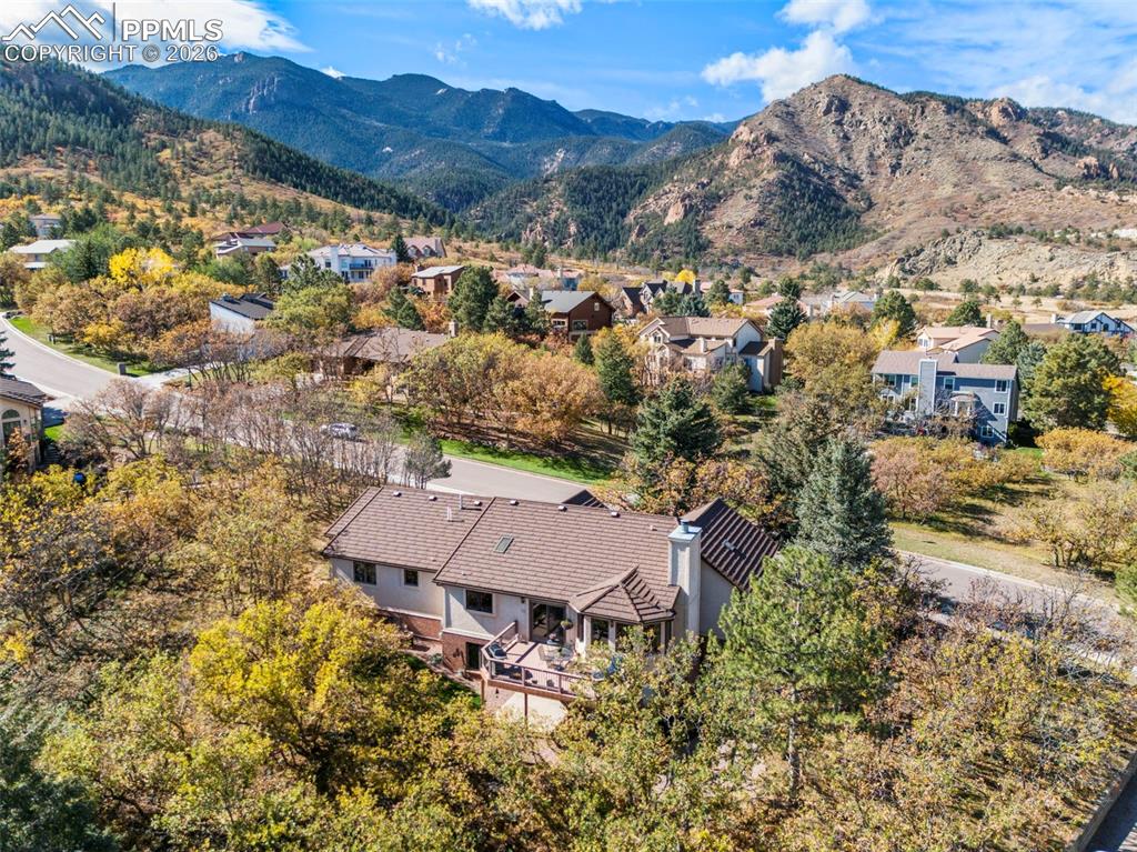 735 Pollux Drive Colorado Springs, CO 80906 - Photo 45 of 50 an aerial view of house with yard and mountain view in back
