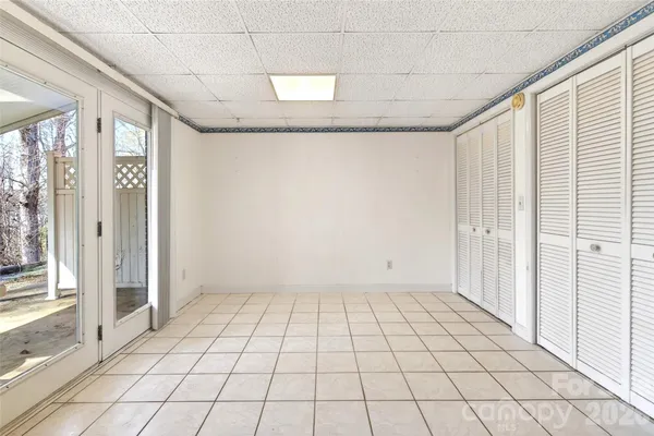 a view of an empty room and window