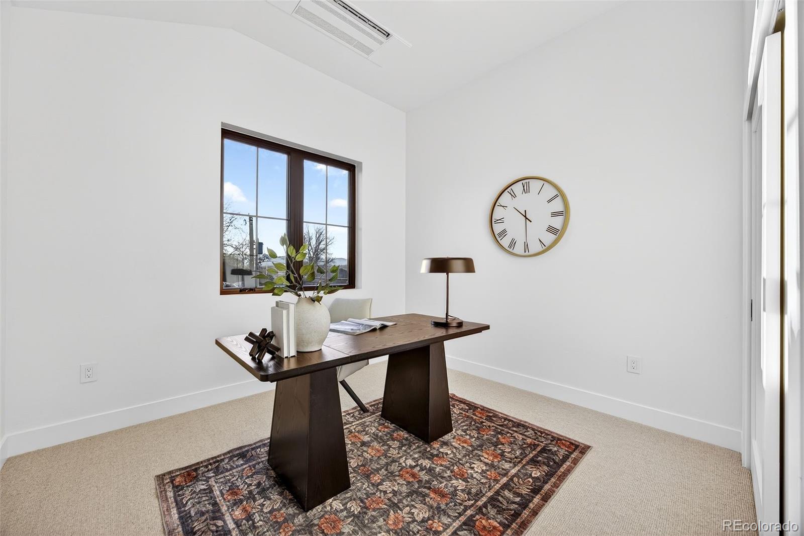 5175 Raleigh Street Denver, CO 80212 - Photo 26 of 49 a dining room with table and a window