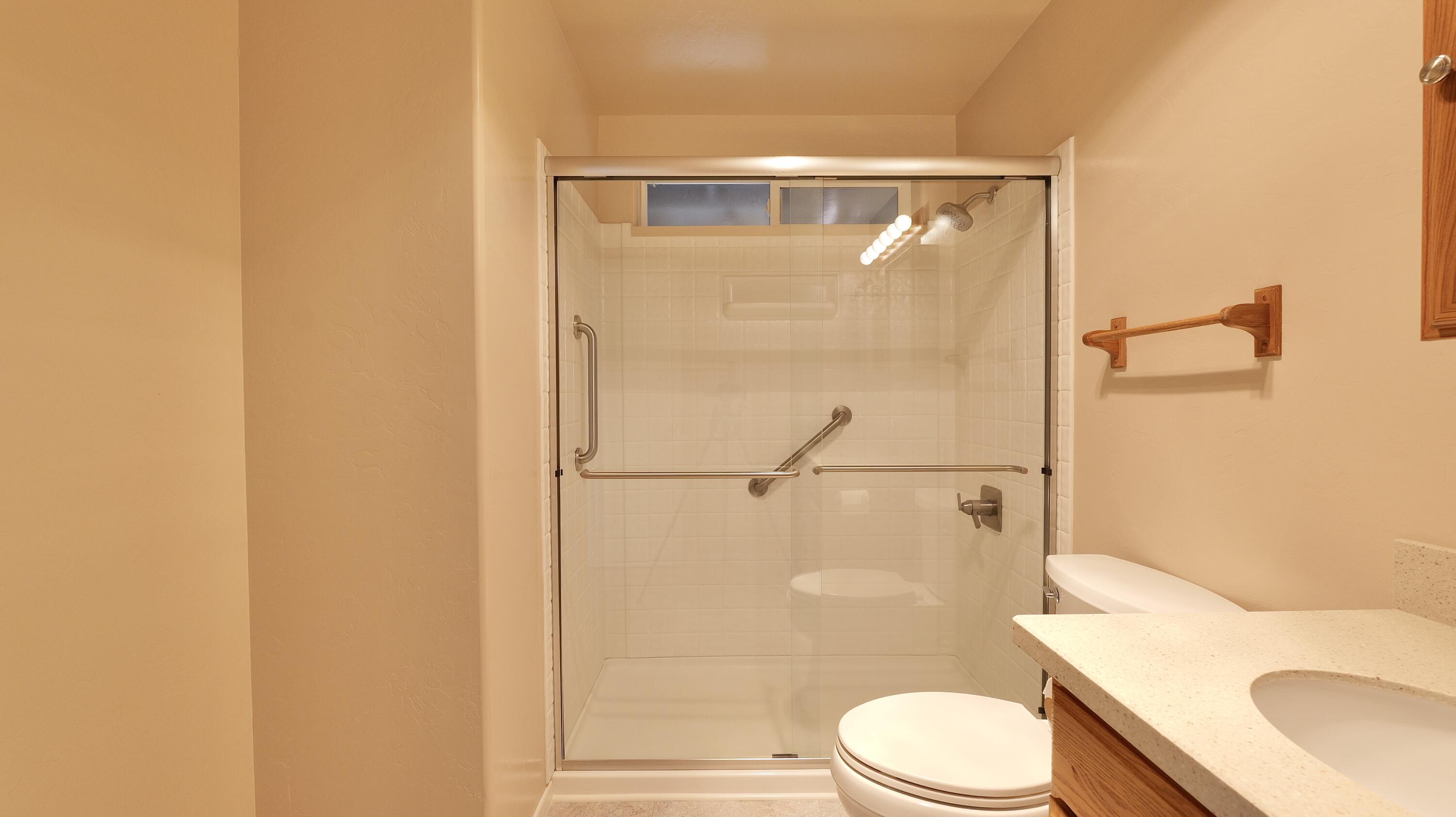 204 Shipley Terrace Prospect, OR 97536 - Photo 26 of 61 a bathroom with a toilet and a shower