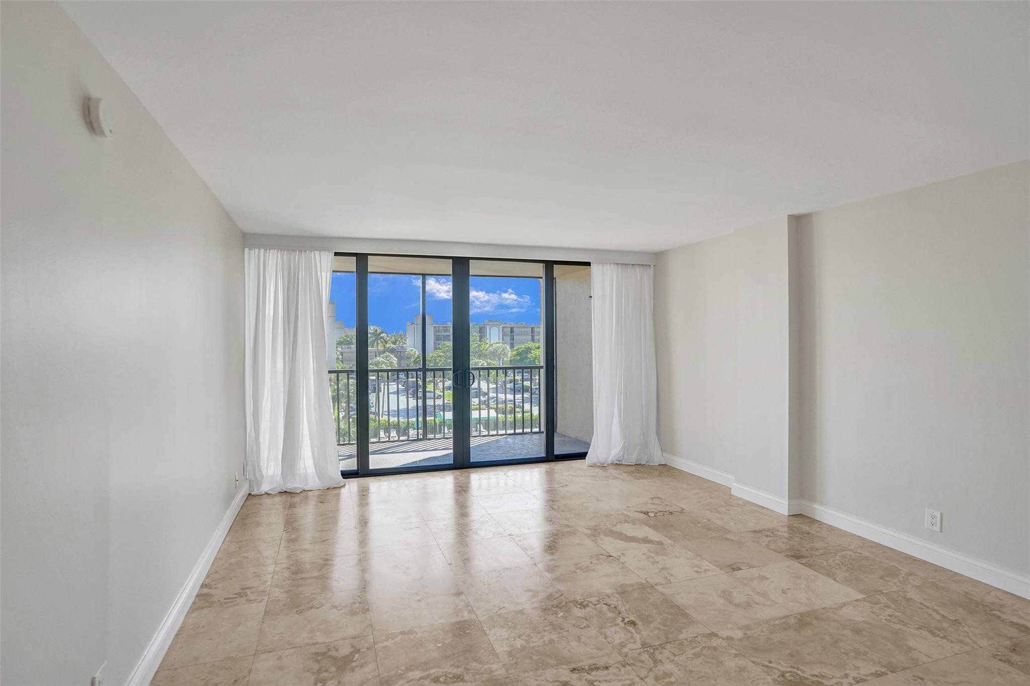 4 Royal Palm Way, Unit 503 Boca Raton, FL 33432 - Photo 13 of 36 wooden floor in an empty room with a window