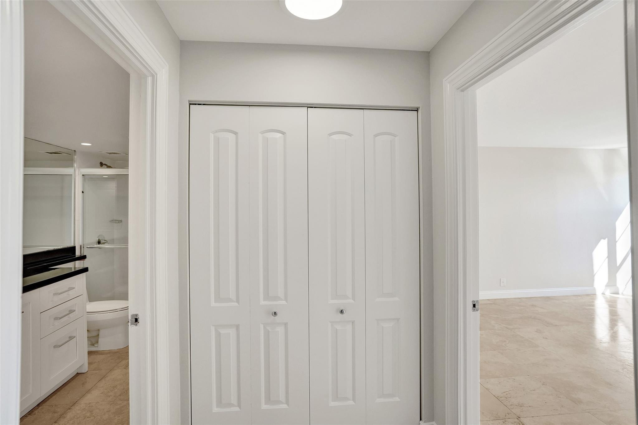 4 Royal Palm Way, Unit 503 Boca Raton, FL 33432 - Photo 20 of 36 a view of a hallway with closet area