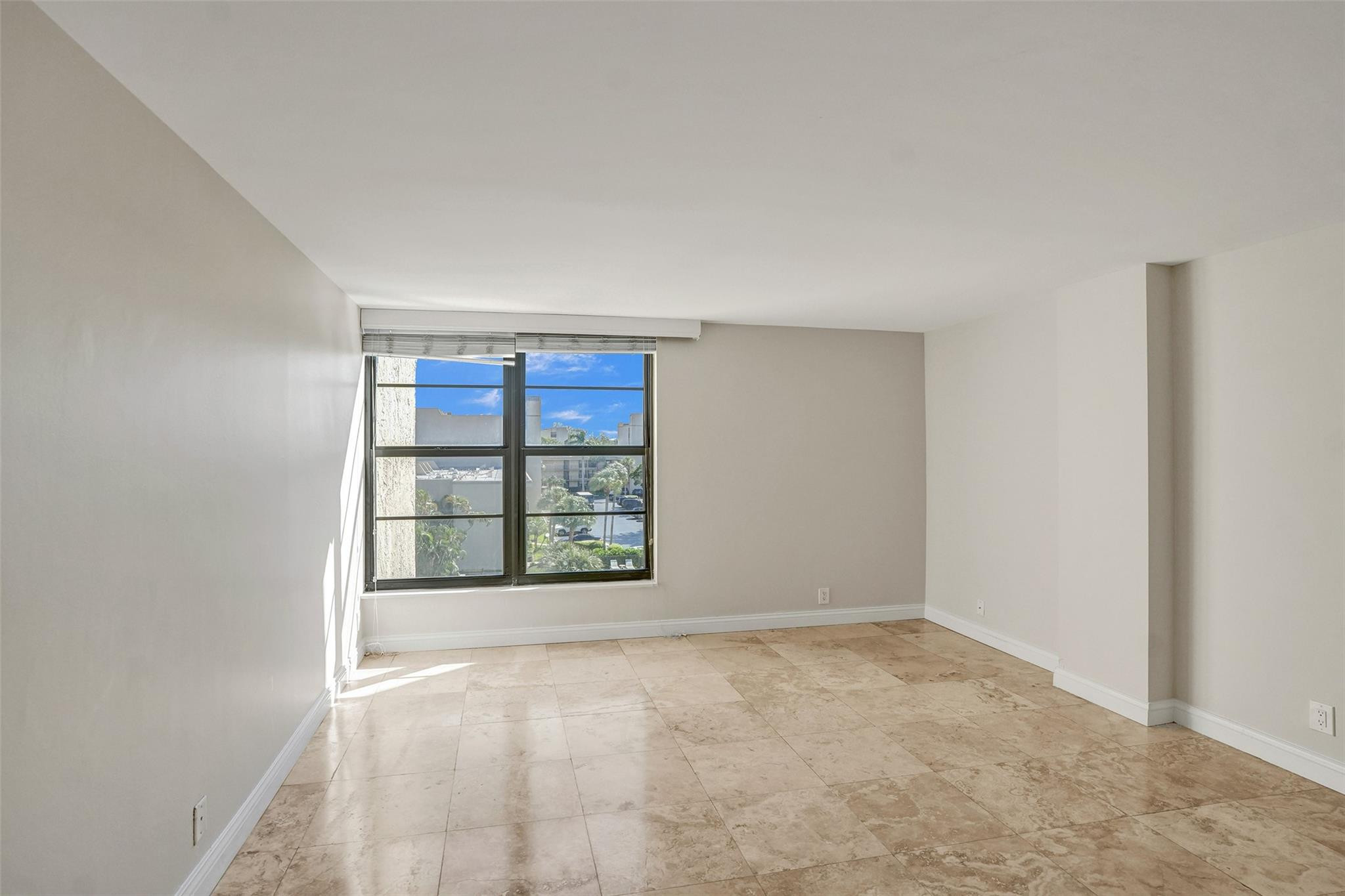 4 Royal Palm Way, Unit 503 Boca Raton, FL 33432 - Photo 25 of 36 an empty room with windows