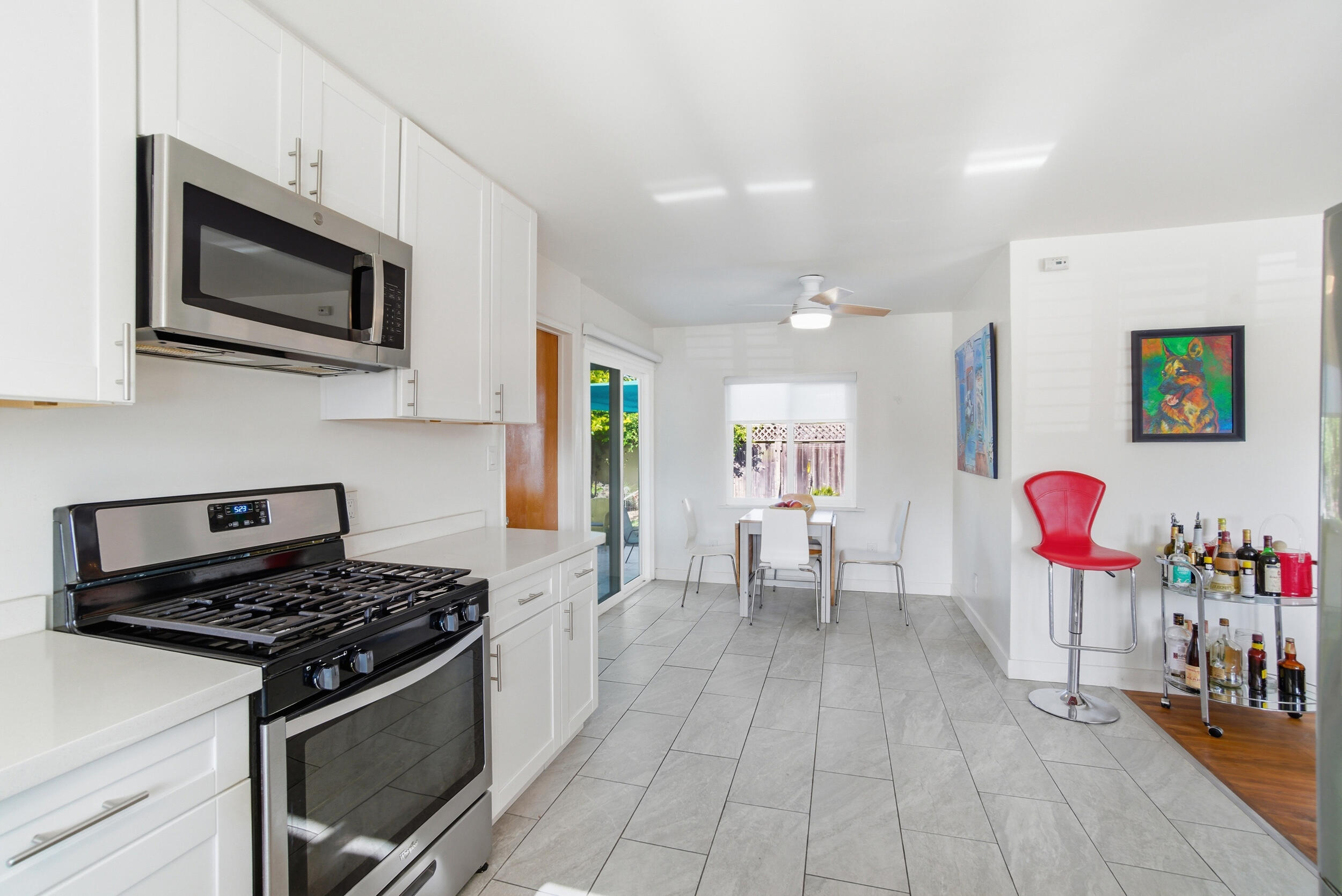 700 North M Street Oxnard, CA 93030 - Photo 12 of 35 a kitchen with a stove and a microwave