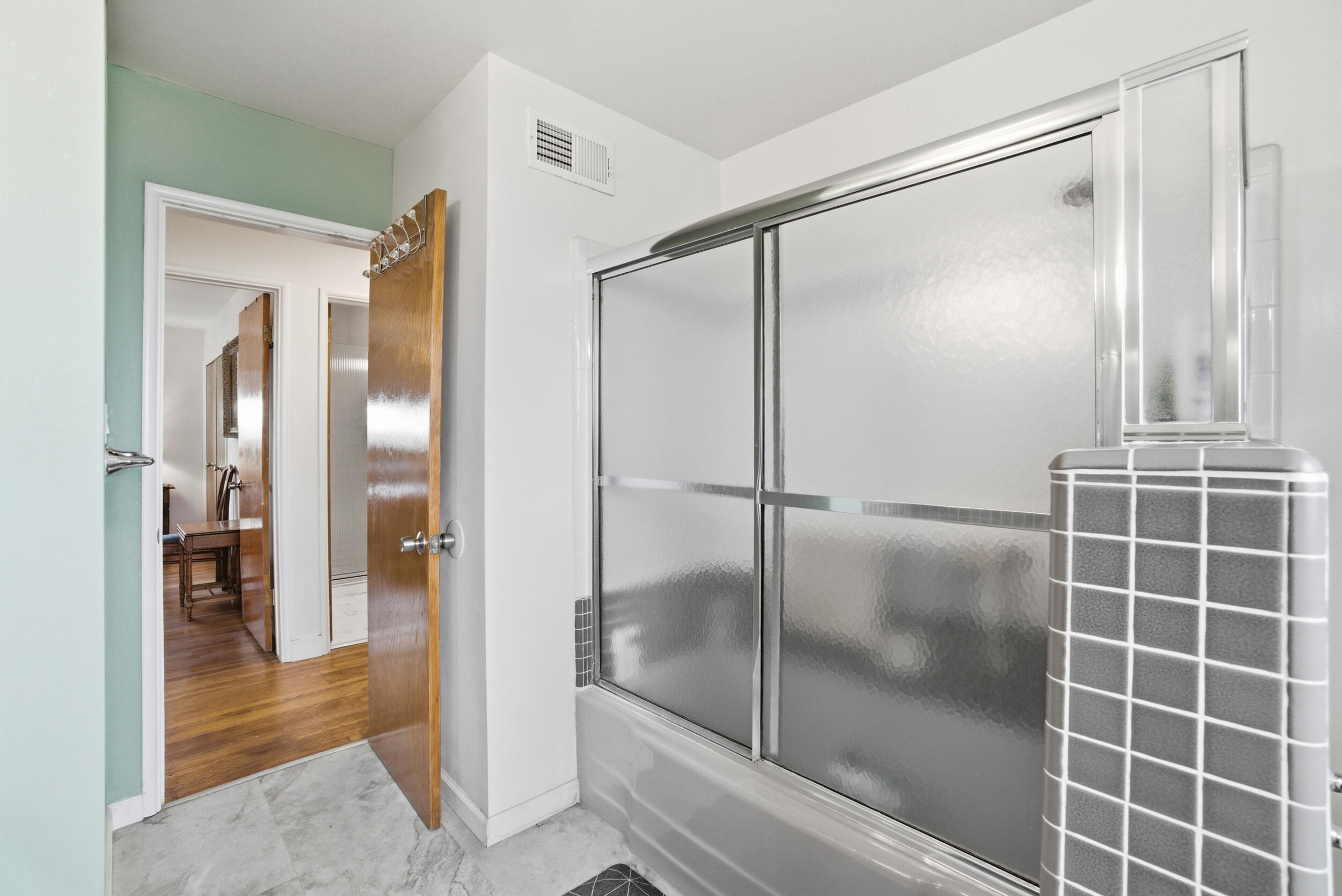 700 North M Street Oxnard, CA 93030 - Photo 17 of 35 a walk in closet with a glass door shower