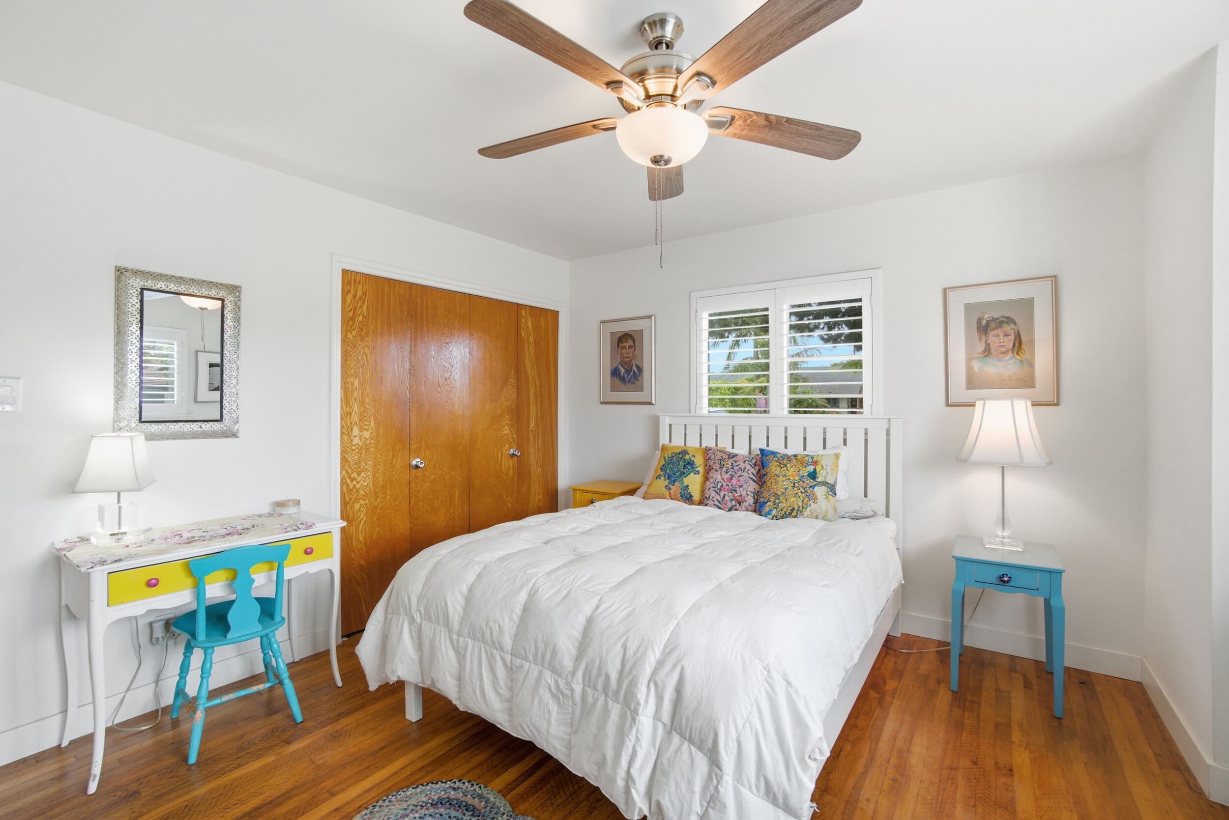 700 North M Street Oxnard, CA 93030 - Photo 21 of 35 a bedroom with a bed a table and chair