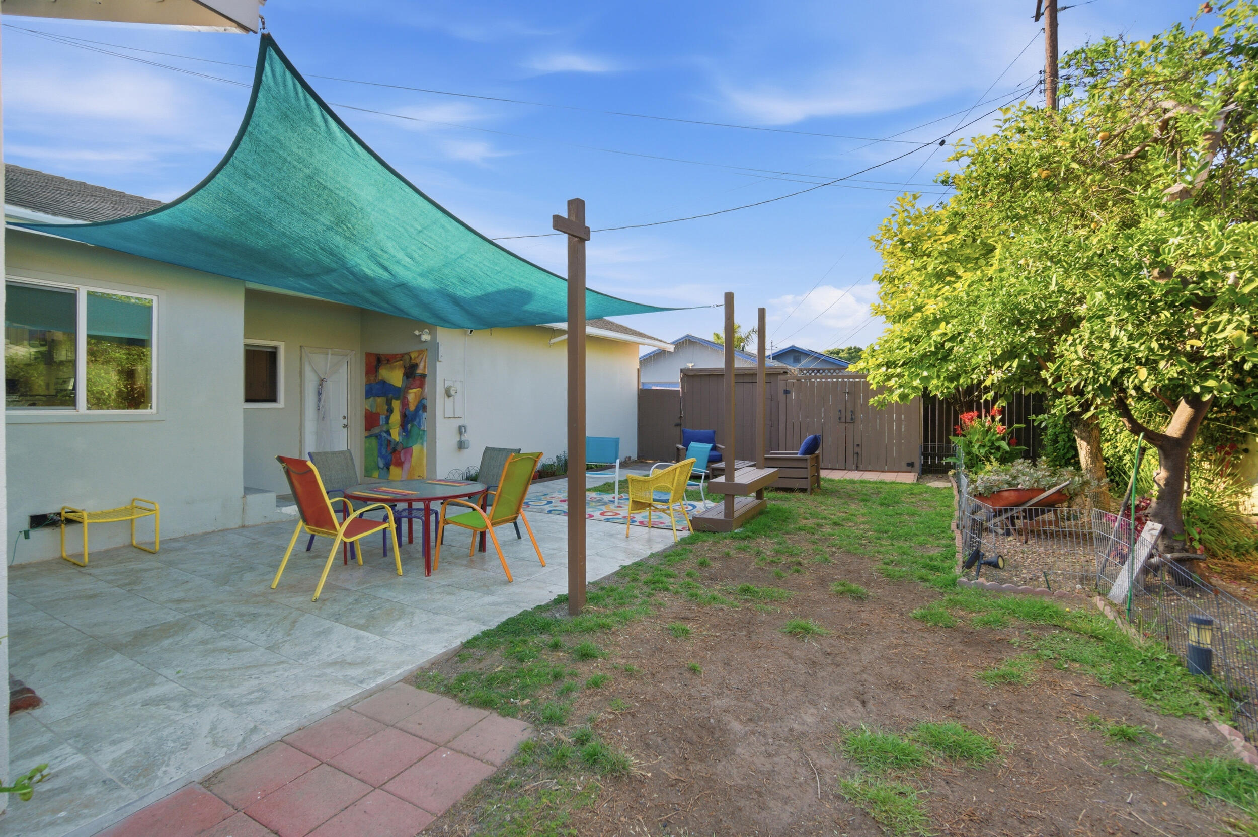 700 North M Street Oxnard, CA 93030 - Photo 26 of 35 a backyard of a house with table and chairs
