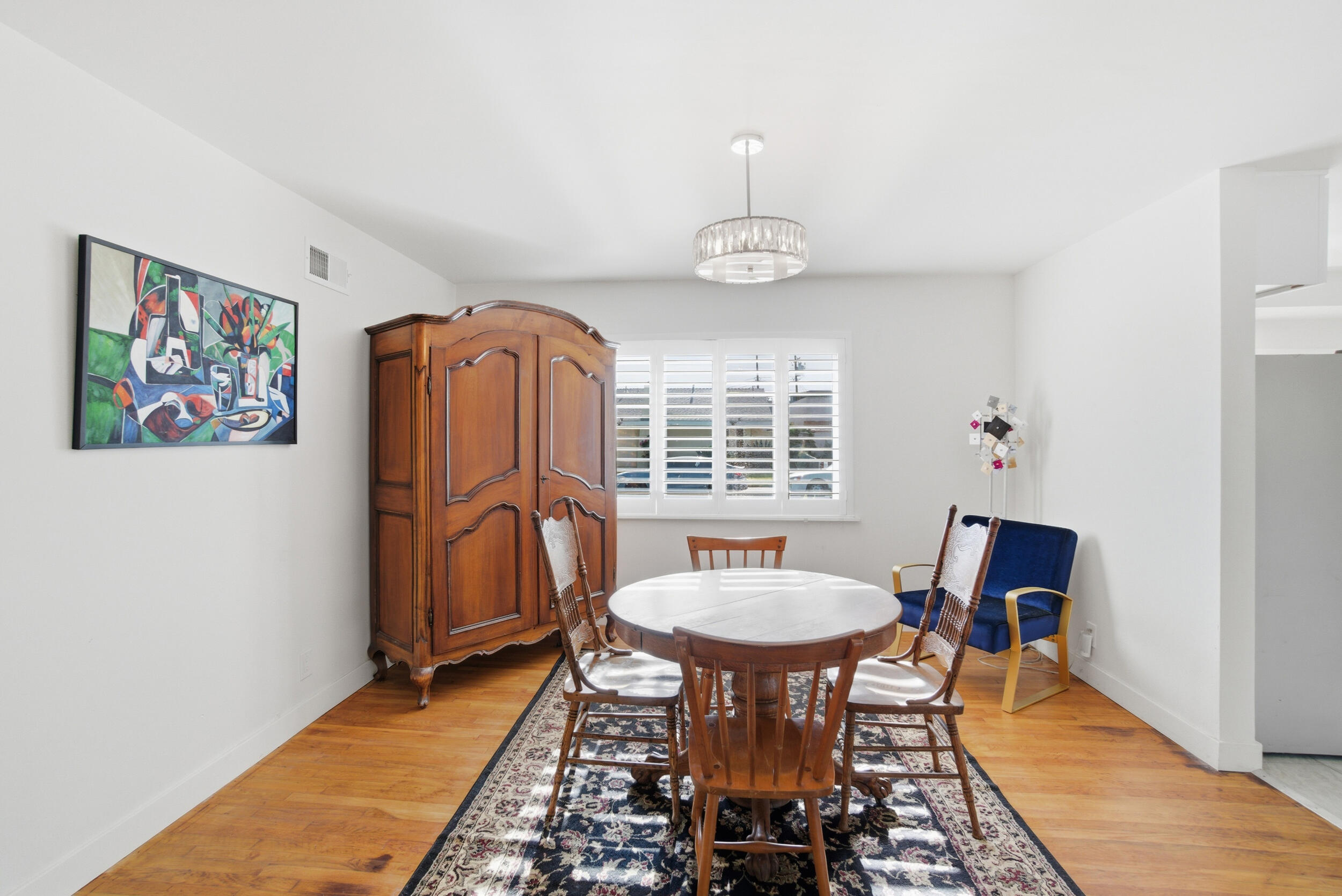 700 North M Street Oxnard, CA 93030 - Photo 9 of 35 a view of a dining room with furniture and chandelier