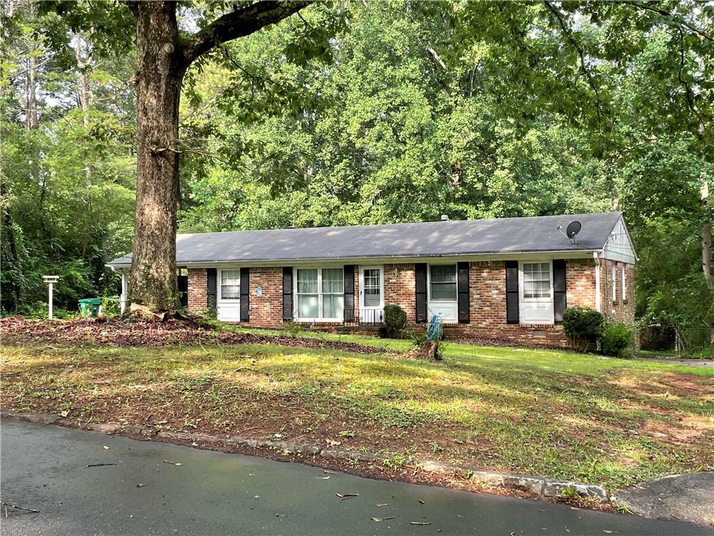 460 Mt Vista Road Stone Mountain, GA 30087 - Photo 1 of 1 Single story home with a front lawn