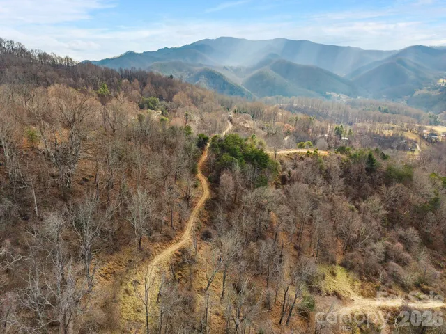 a view of mountain view with mountains in the background