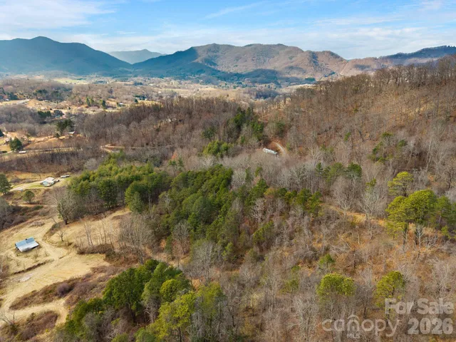 a view of mountain view with mountains in the background