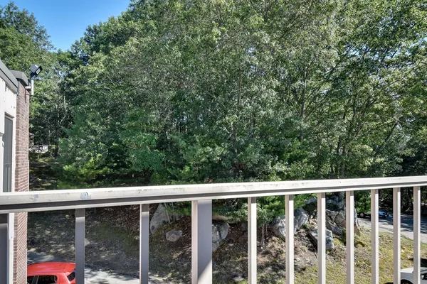 a view of a balcony with an outdoor space