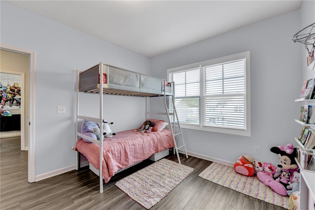 148 Logan Pass Drive Loganville, GA 30052 - Photo 49 of 103 a bedroom with a bed and a window