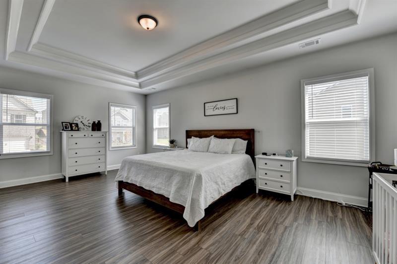 148 Logan Pass Drive Loganville, GA 30052 - Photo 73 of 103 a bedroom with a bed and a window