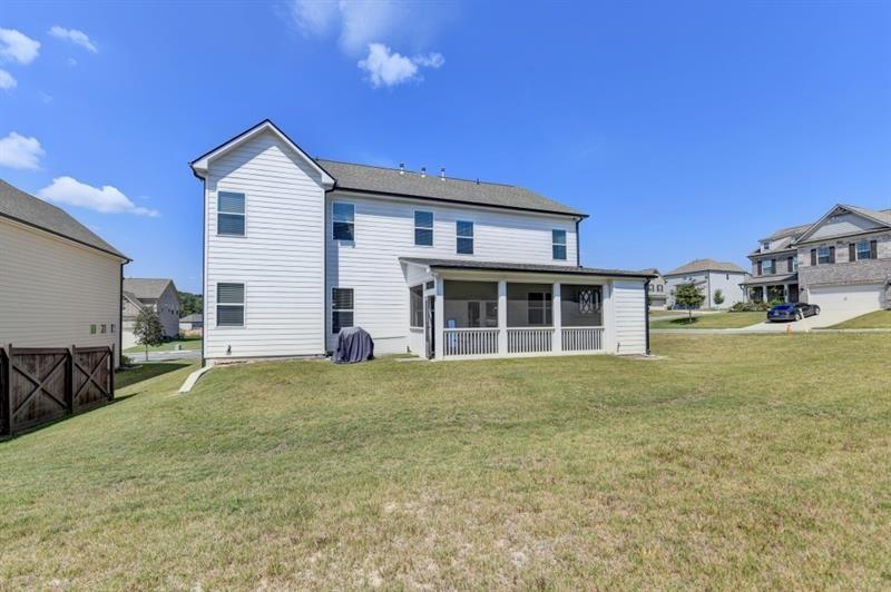 148 Logan Pass Drive Loganville, GA 30052 - Photo 85 of 103 a front view of a house with a yard