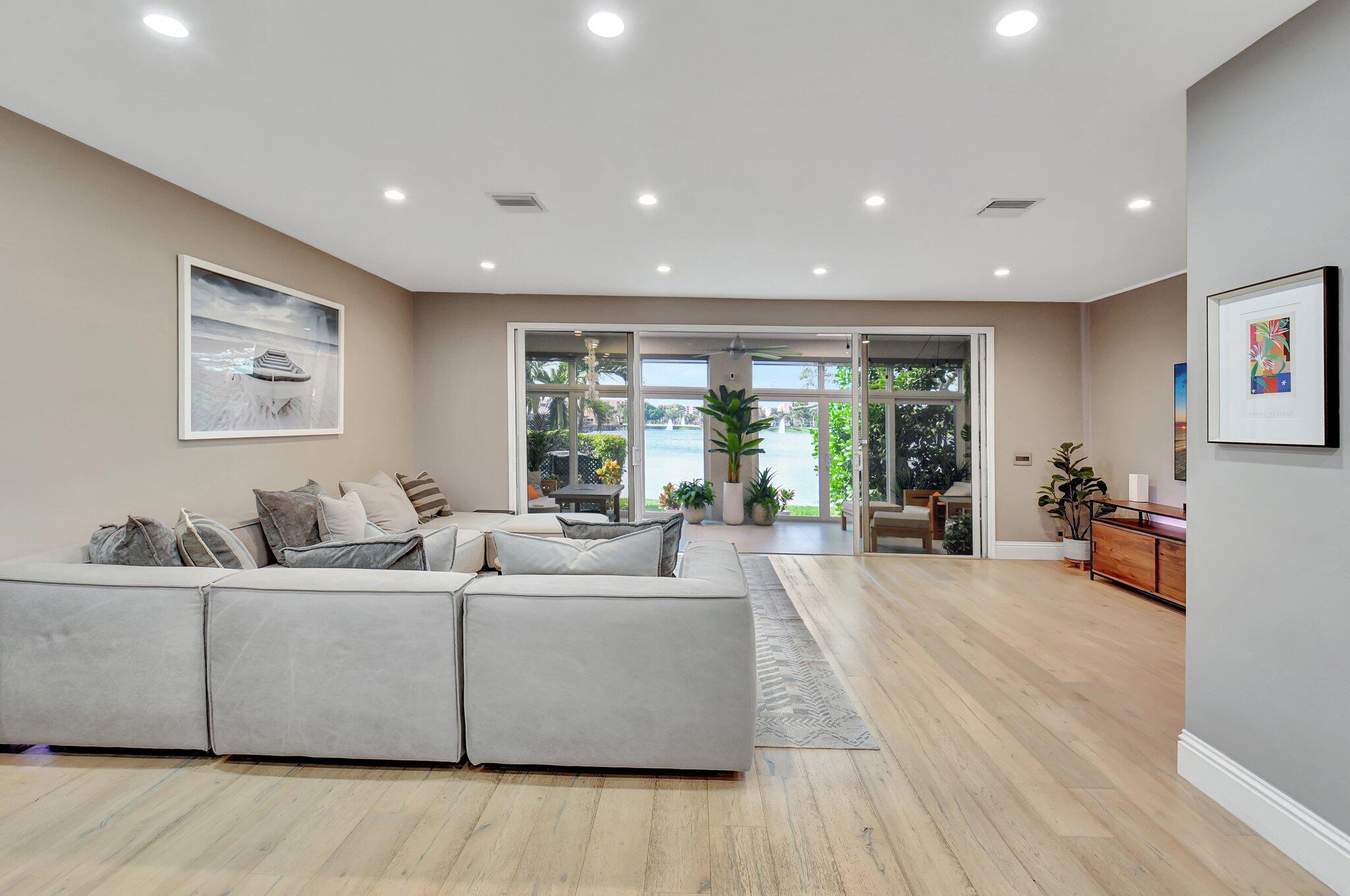 6795 Via Regina Boca Raton, FL 33433 - Photo 17 of 83 a living room with furniture and a large window