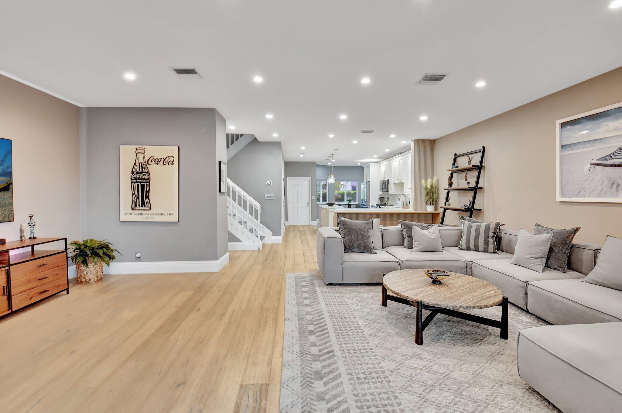6795 Via Regina Boca Raton, FL 33433 - Photo 20 of 83 a living room with furniture and a table
