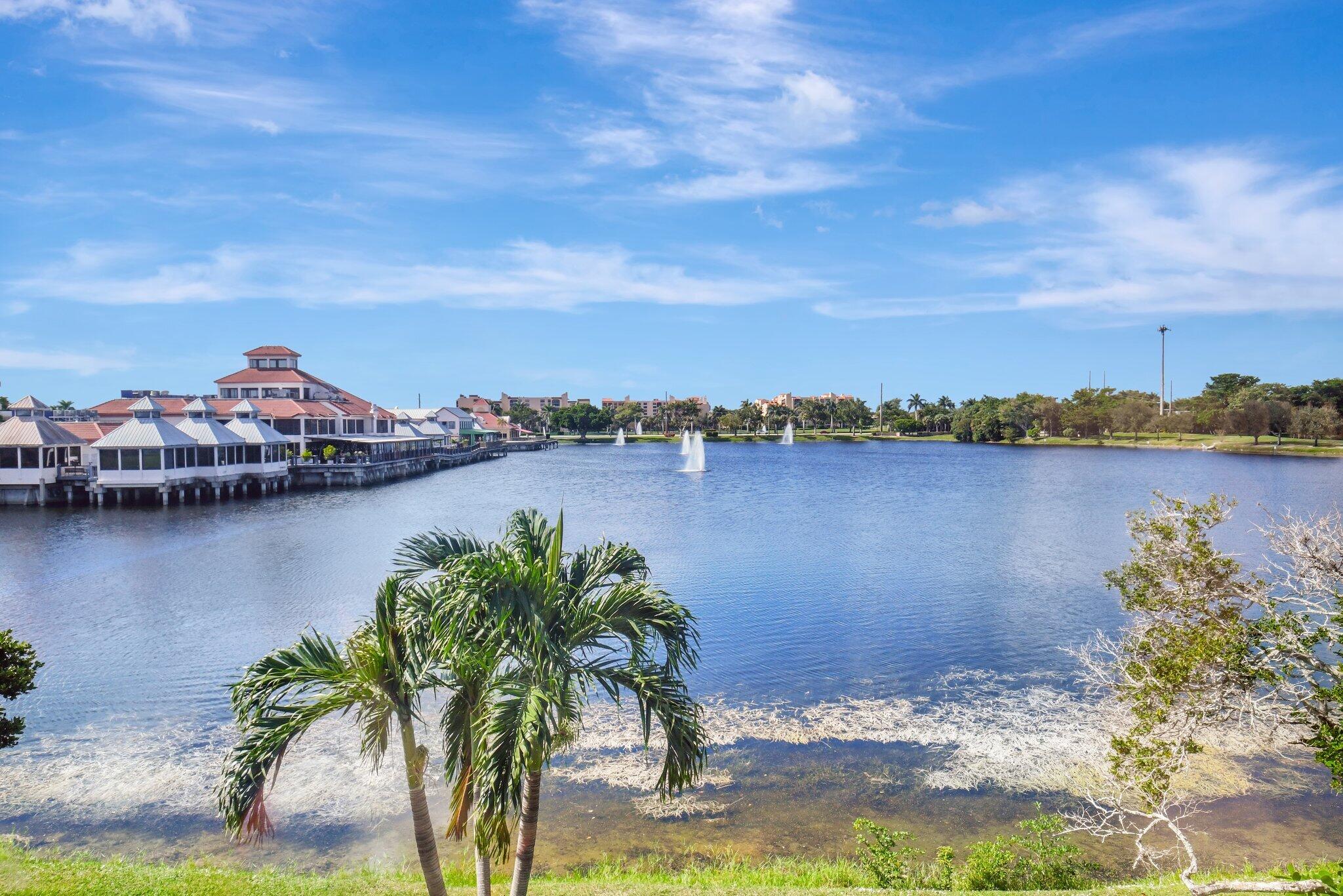 6795 Via Regina Boca Raton, FL 33433 - Photo 44 of 83 a view of a lake with houses