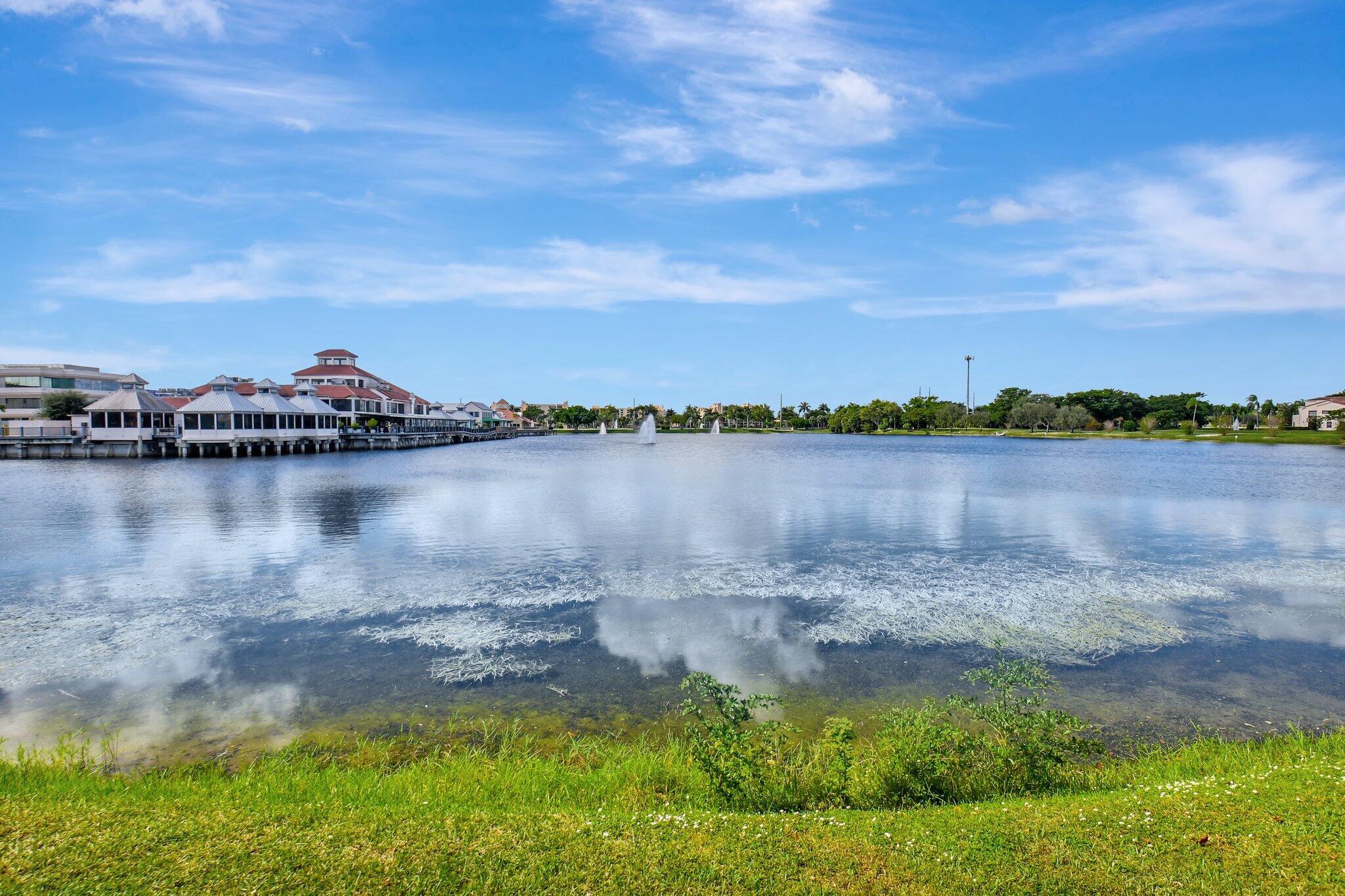 6795 Via Regina Boca Raton, FL 33433 - Photo 45 of 83 a view of a lake with houses in the back