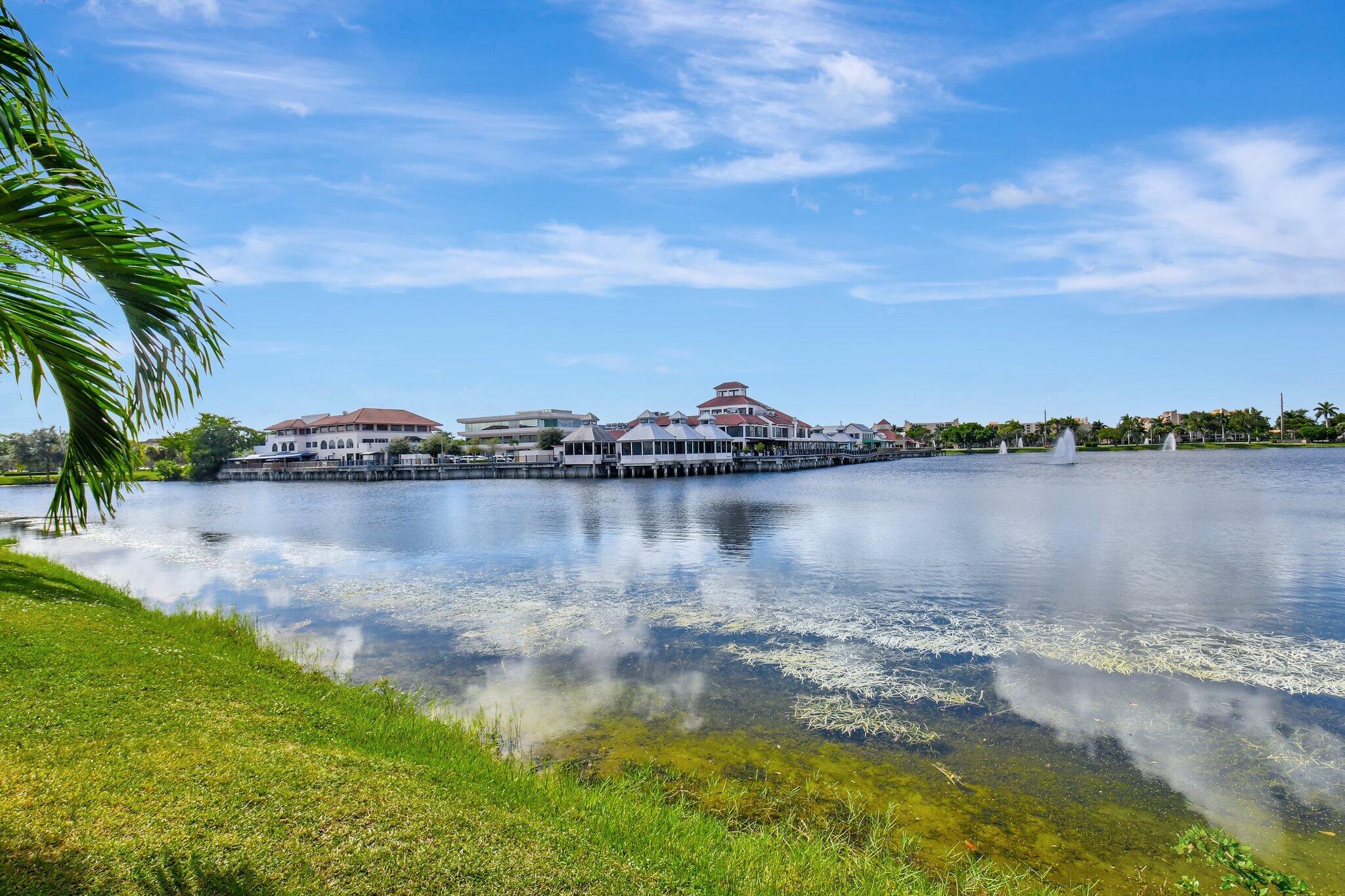 6795 Via Regina Boca Raton, FL 33433 - Photo 47 of 83 a view of a lake with houses in the background