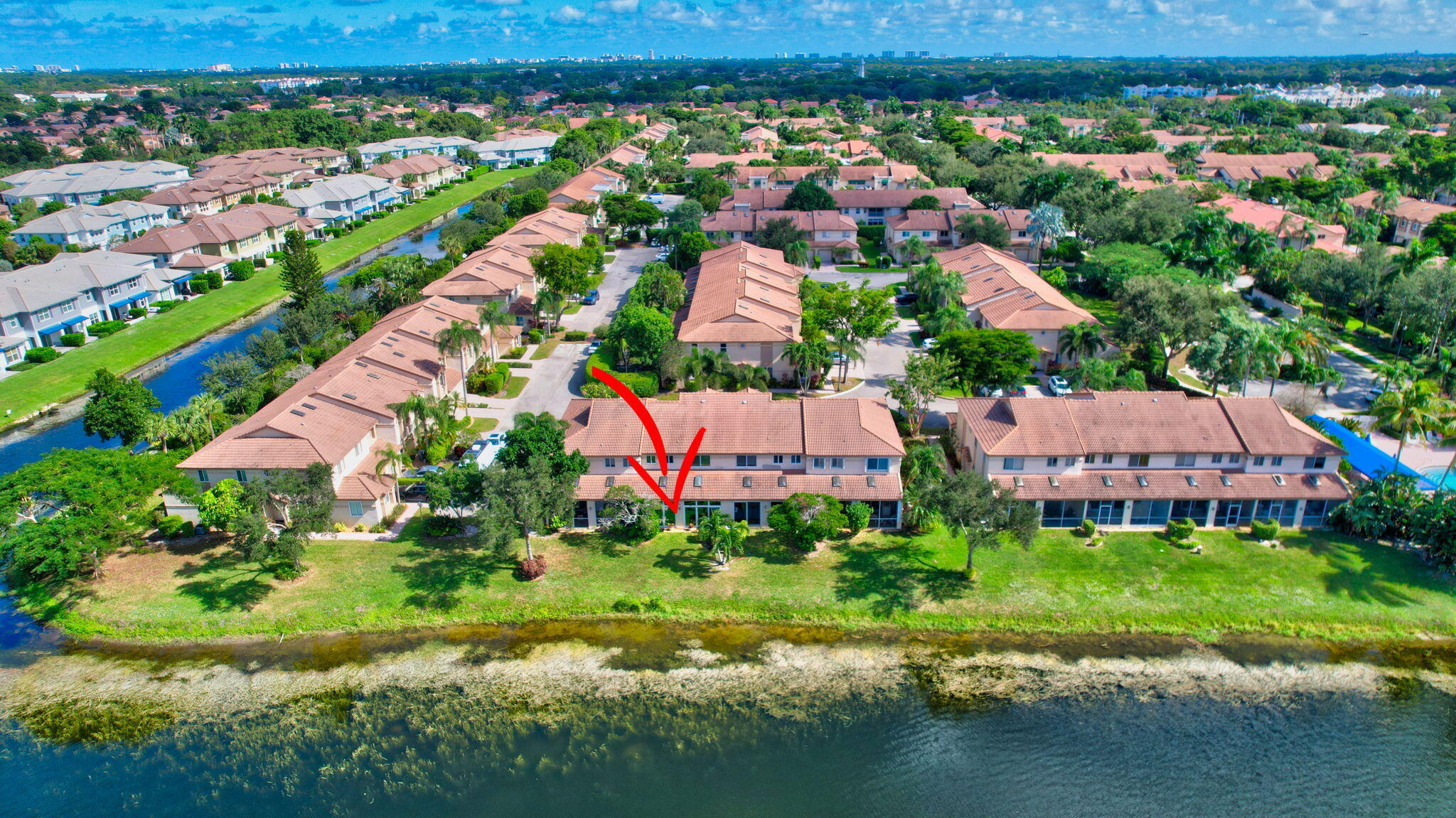 6795 Via Regina Boca Raton, FL 33433 - Photo 53 of 83 an aerial view of residential houses with outdoor space and river